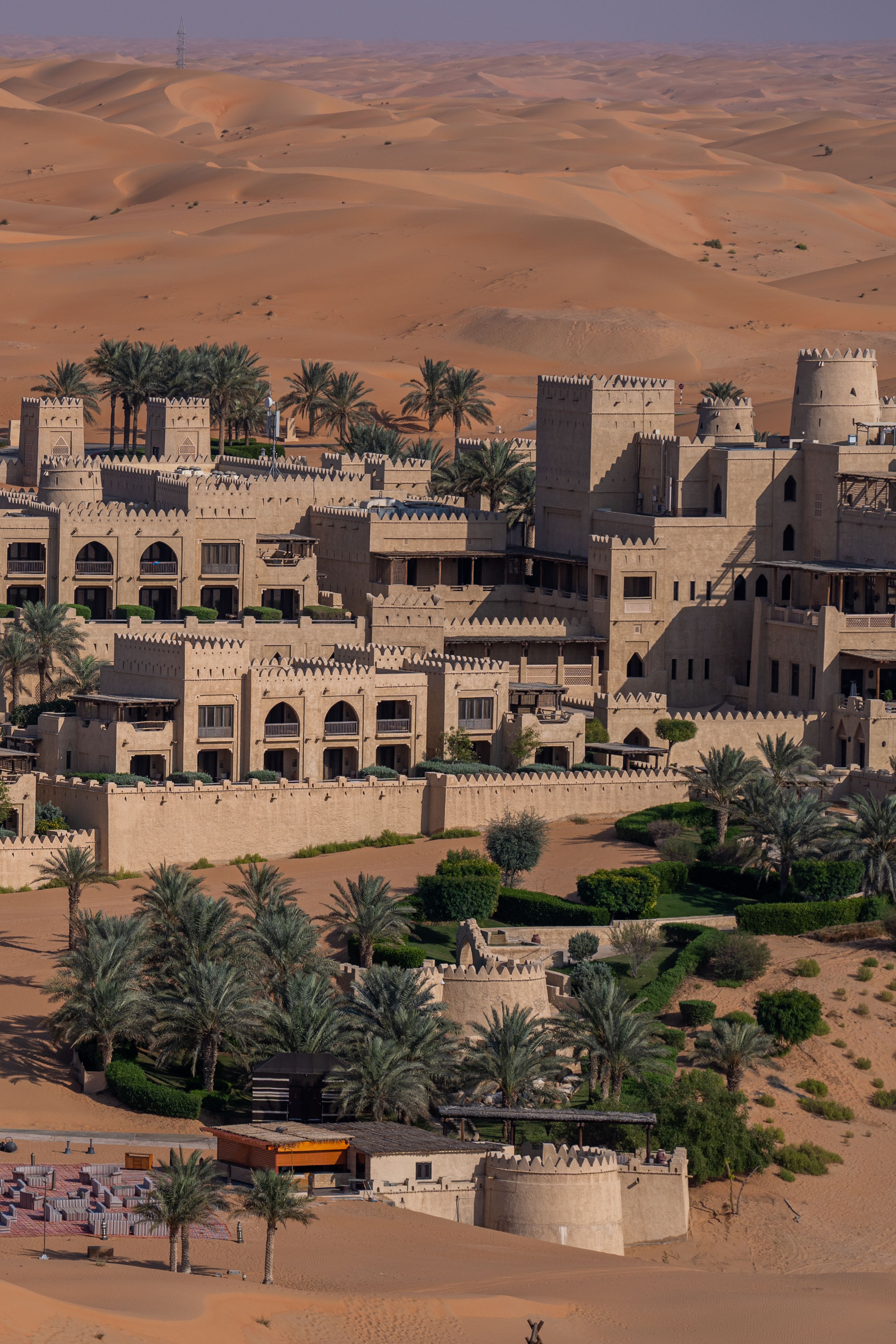 Desert resort surrounded by dunes and palm trees, the Gulf