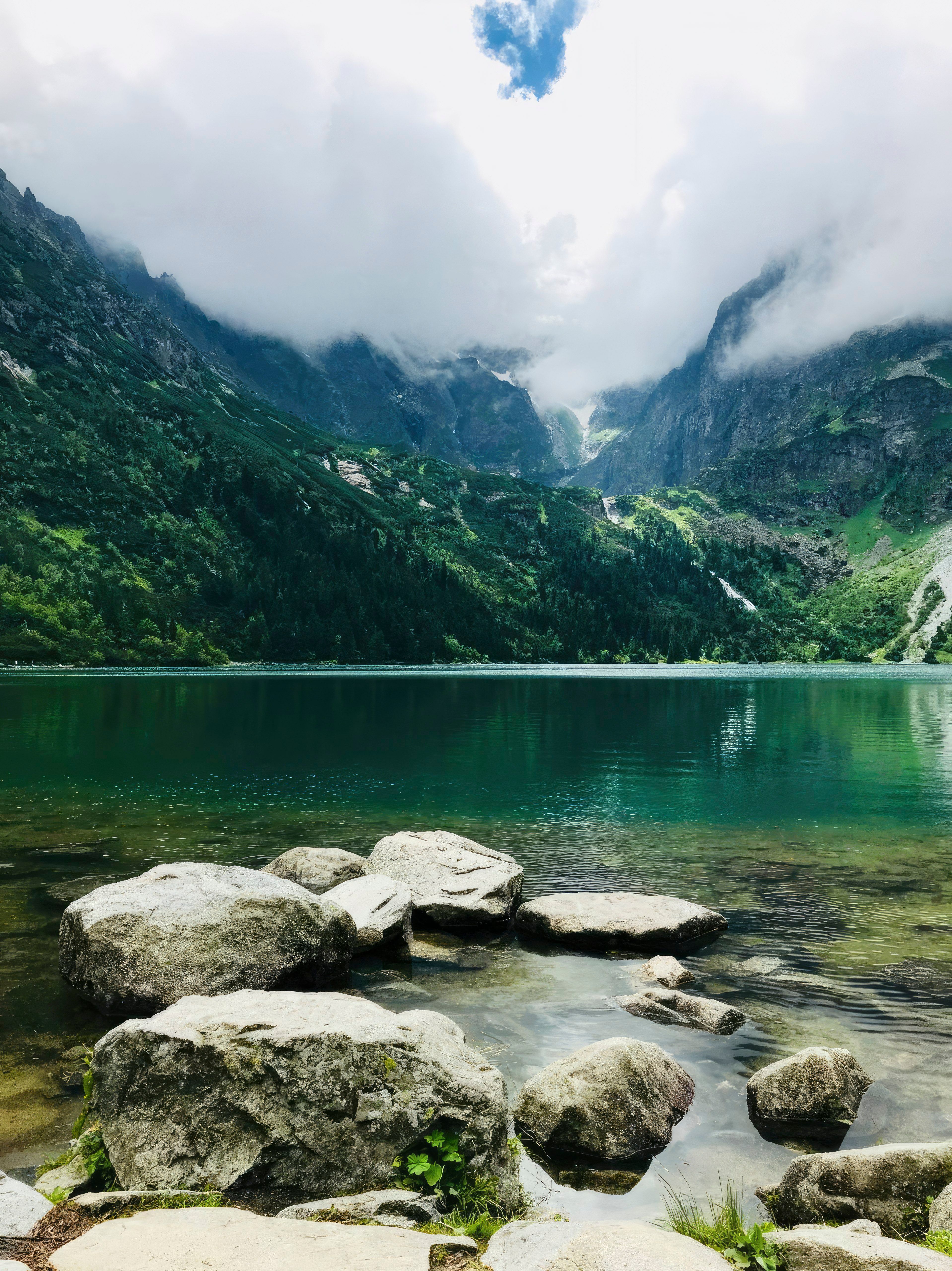 Misty mountain lake in the Tatra mountains, Poland